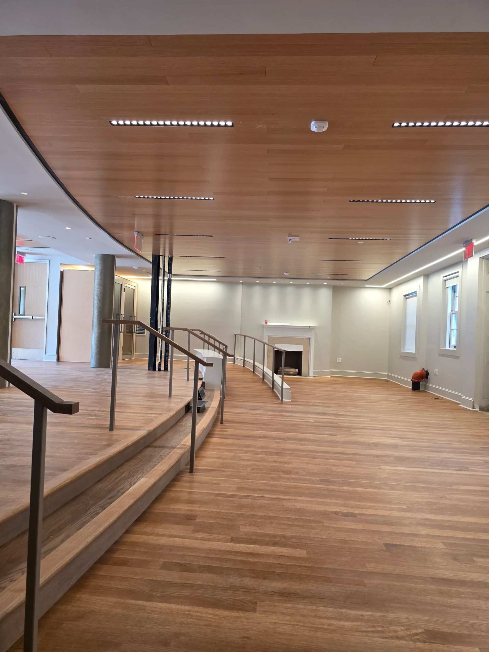 Finished wood flooring on a curved upper landing