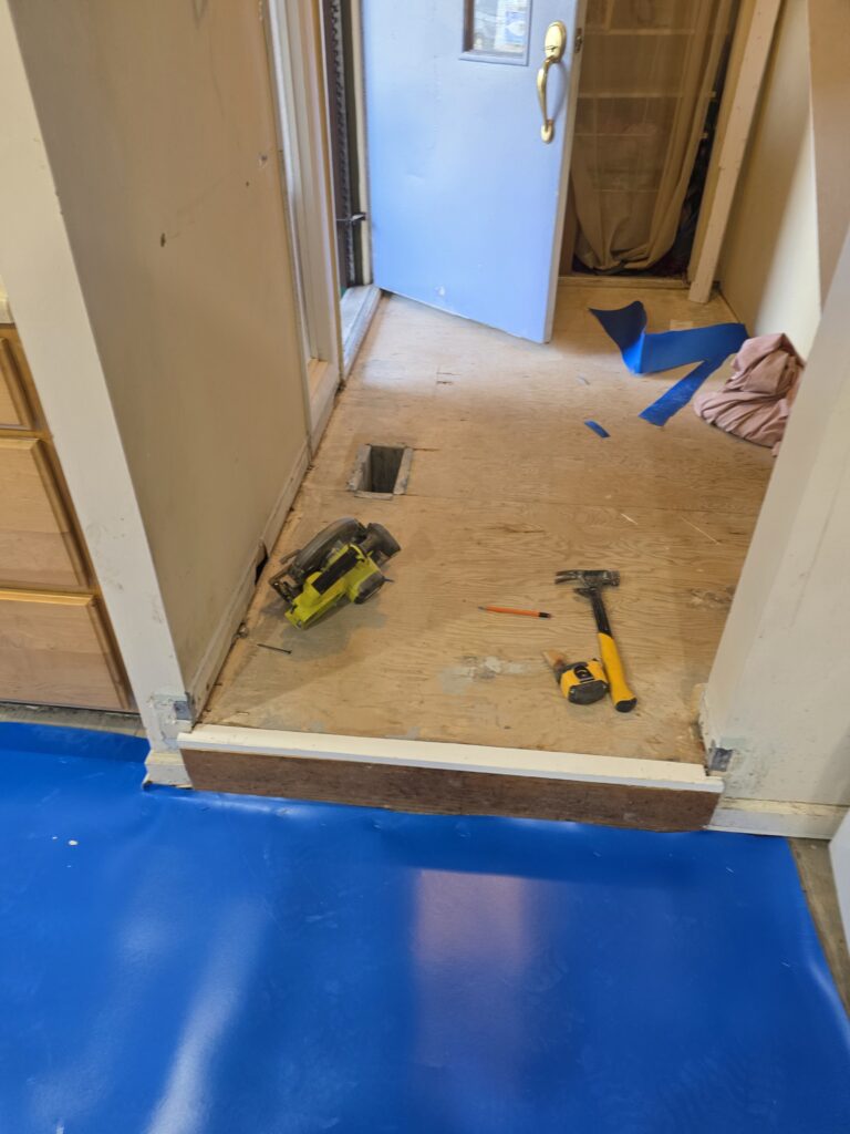 Is laminate flooring waterproof? A moisture barrier laid over a subfloor before planks