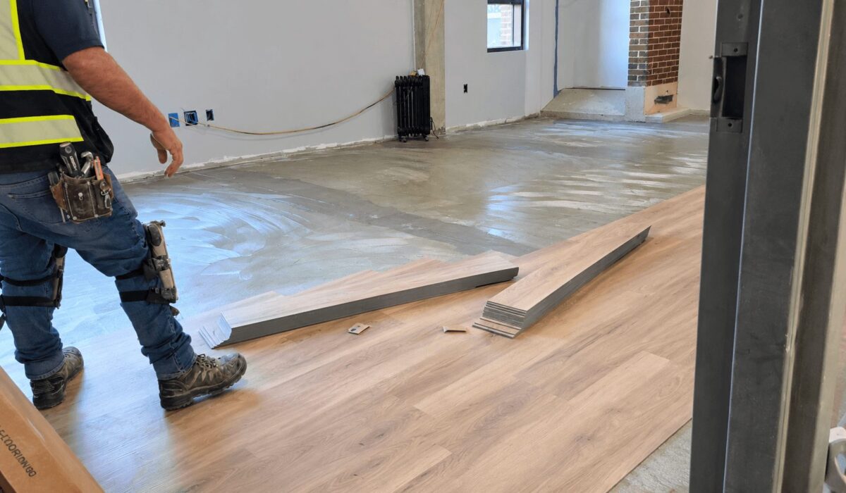 Concrete slab prepared with self-leveling compound before waterproof LVP installation
