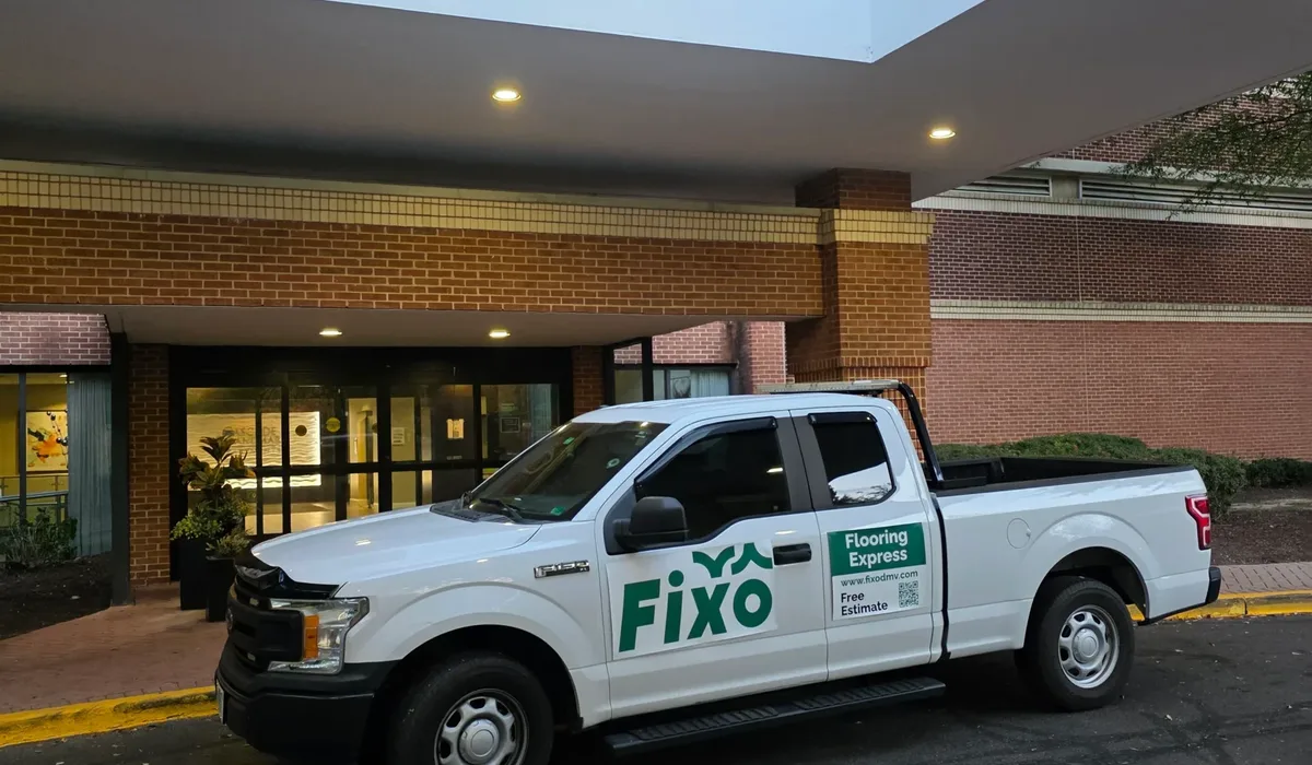 FIXO service truck parked at a Northern Virginia building entrance
