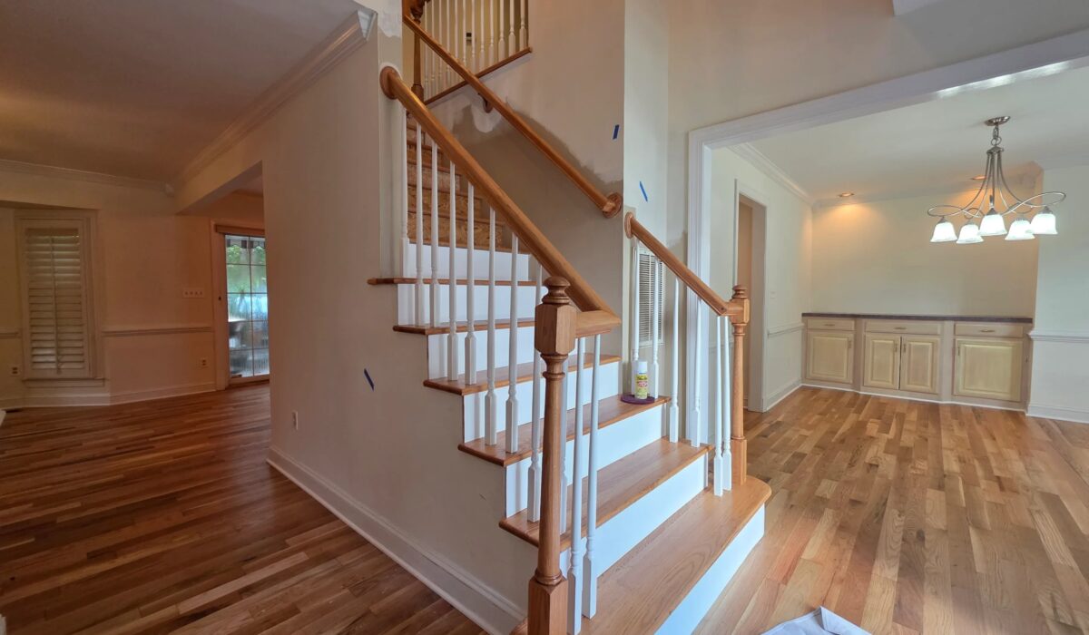 Hardwood entry hall running to the staircase, a common layout for hardwood floor installation in Alexandria VA colonials