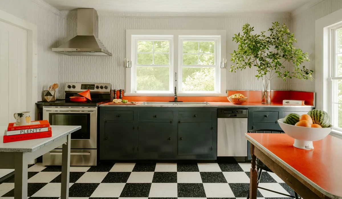 Kitchen with a black and white checkerboard floor, a classic pattern linoleum tiles can recreate