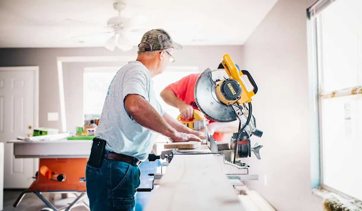 Miter saw set up on a stand for cutting laminate planks to length
