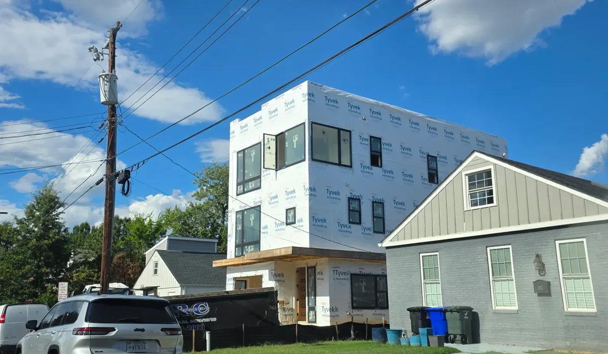 Detached house and townhouse exteriors typical of Northern Virginia neighborhoods